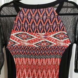 Beautiful figure accentuating dress by Julienne